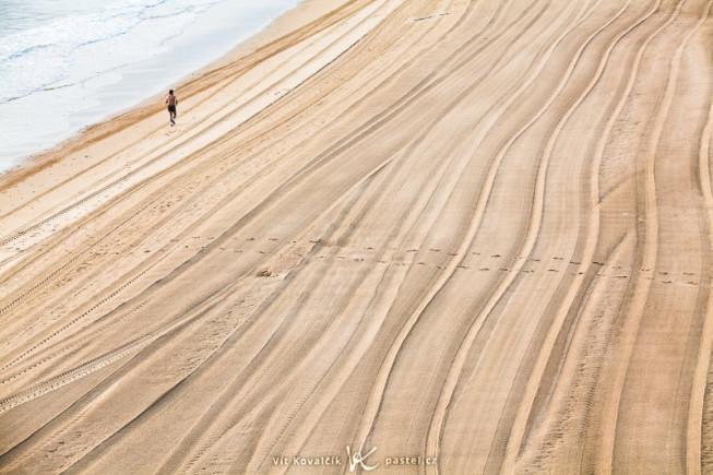 A morning beach after grooming, with athlete. Without the jogger, this picture would be boring. Canon 5D Mark II, EF Canon 70–200 F2.8 IS II USM, 1/25 s, F8.0, ISO 100, focus 115 mm. Photo: Vít Kovalčík