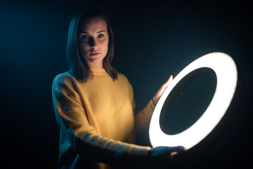 Portraits With an LED Ring Light - holding